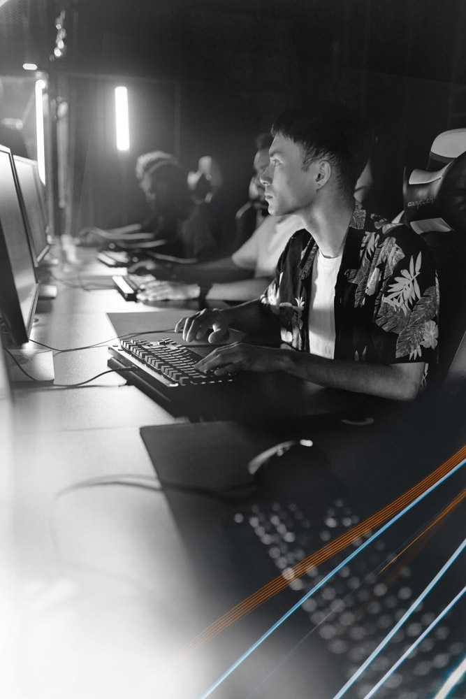 Gamers playing on PCs at an event using Chromaport for seamless, high-performance and low-latency remote game streaming.