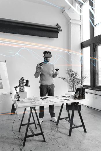 Team of game developers and QA engineers coding and testing on PCs using Chromaport remote development environments and shared testing setups.